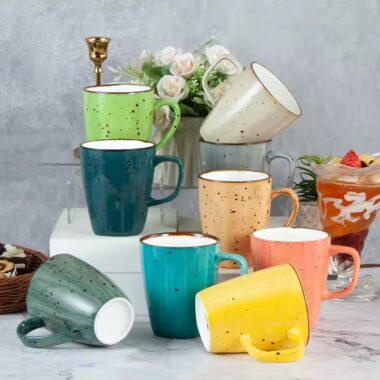 Handmade retro-style ceramic mug with colorful glazed finish
