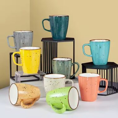 Handmade retro-style ceramic mug with colorful glazed finish