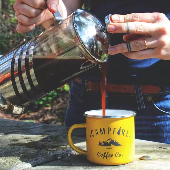 Eco-friendly enamel travel mug with lightweight, reusable design