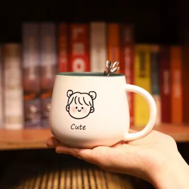 Cute high-quality ceramic coffee mug with cartoon-style design and handle
