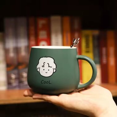 Cute high-quality ceramic coffee mug with cartoon-style design and handle