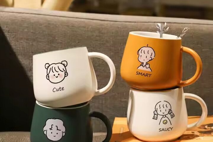 Cute high-quality ceramic coffee mug with cartoon-style design and handle