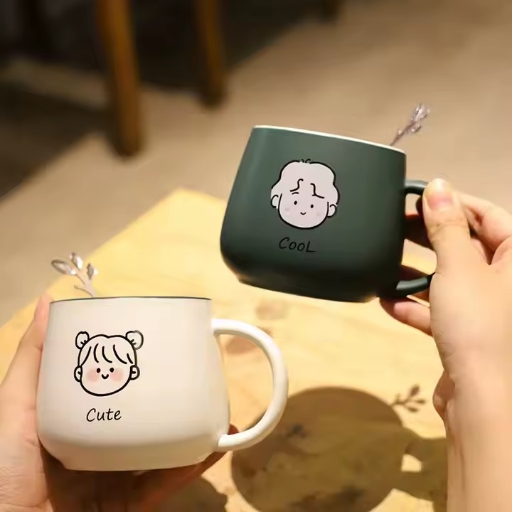 Cute high-quality ceramic coffee mug with cartoon-style design and handle