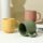 Handmade colorful clay ceramic mug with artistic texture