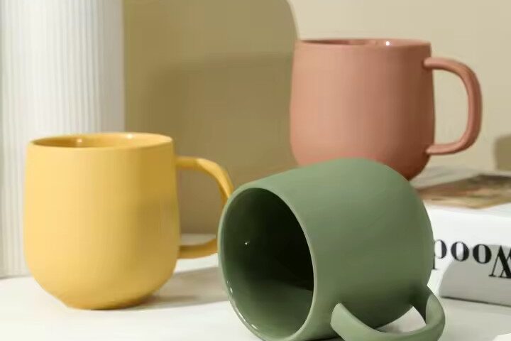 Handmade colorful clay ceramic mug with artistic texture